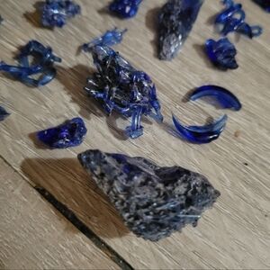 Assorted Cobalt Blue Glass Shards, Differnt Types Of Glass Decor, And Crystals